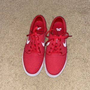 Red Nike shoes